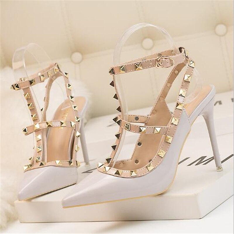 New 10CM woman Sexy nightclub stiletto heels patent-leather metallic rivet hollow Roman fashion sandals